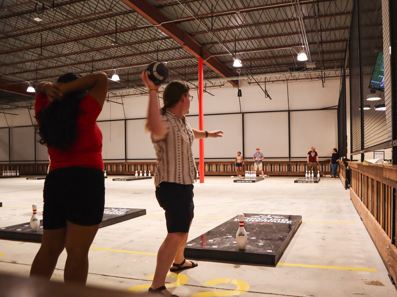 Person Throwing Football at Fowling Warehouse in Omaha, Nebraska